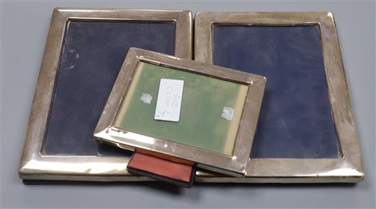 Three assorted modern silver mounted photograph frames, largest 22.2cm.